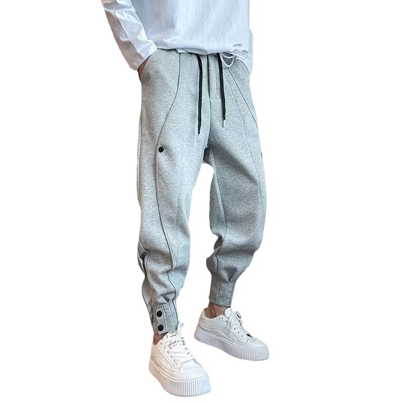 2022 nueva costura pantalones casuales marca de moda de los hombres breasted Pantalones deportivos flacos pantalones de harén sueltos con cordones