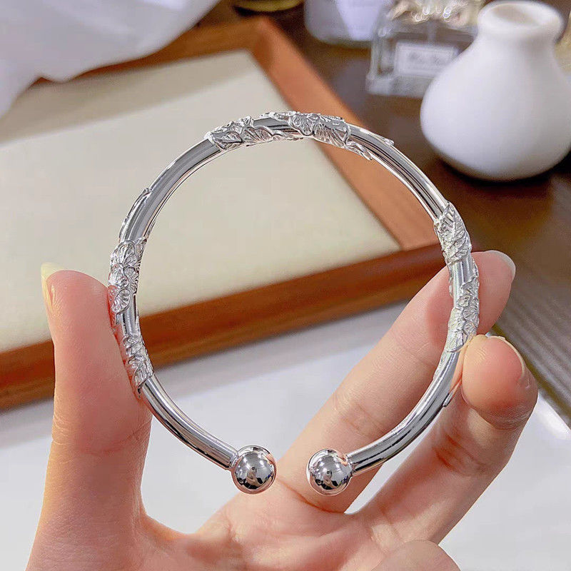 Flores como brocado sólido pulsera push-pull de flores de mujer mariposa estilo nicho temperamento de alta calidad pulsera ajustable