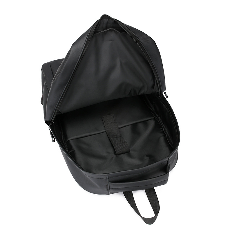 Mochila de hombre de nueva moda Mochila casual salvaje impermeable y resistente al desgaste Mochila de computadora para estudiantes de secundaria al por mayor