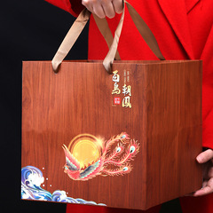 Tea set with Jin Jun Mei tea leaves in small red canisters, high-end gift box, featuring Da Hong Pao and Tie Guan Yin tea, as a premium gift tea.