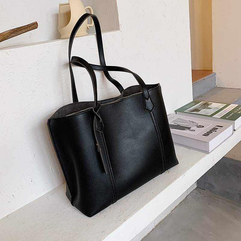 Bolso transfronterizo de las nuevas mujeres bolsa de gran capacidad de superficie blanda bolsa de mano de moda europea y americana bolsa de mensajero de hombro de las mujeres