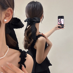 黒いバラの蝶結びのリボンの女性の低い馬尾の髪のひもの復古的な気質の髪のひもの高弾力の頭飾り