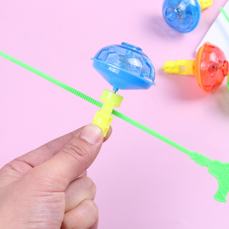 Giroscopio plegable regla luminosa giroscopio juguetes educativos para niños de jardín de infantes al por mayor juguetes para niños transfronterizos