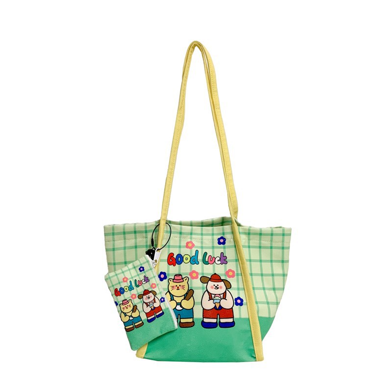 Bolsa de lona de dibujos animados japoneses 2025 nuevo bolso de gran capacidad para estudiantes de escuela primaria bolso de hombro para hombres y mujeres