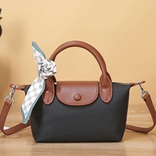 头层牛皮女士同款斜挎百搭特色休闲潮流拼色逛街盖头真皮包包时尚