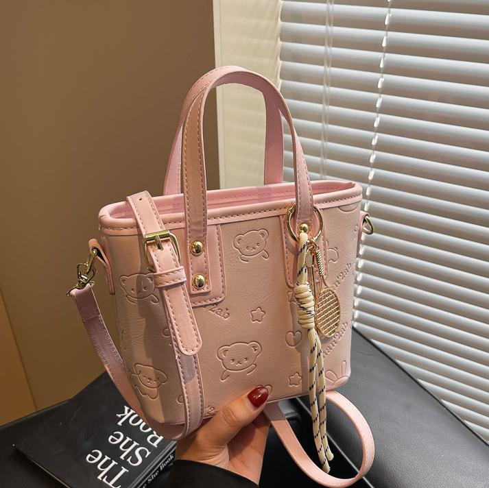 Bolsa de cubo para mujeres 2025 nueva moda versátil bolso de hombro de mano de alta calidad nicho de diseño de mochila de mujer