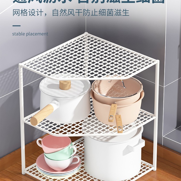 台所の棚のテーブルの角の鍋の収納棚の下の水槽の鍋棚の食器棚の中に鍋の階層棚の神器を入れます。|undefined