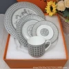 10", 8" plate with cups and saucers four-piece set with gray woven pattern