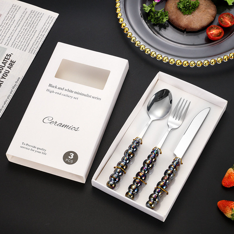 Cuchillo y tenedor de acero inoxidable transfronterizo cuchara de perla de cerámica mangos de cubierta postre cuchara y tenedor set cuchillo y tenedor de filete caja de regalo