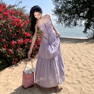 2026夏季仙女度假风长裙挖空大裙摆露腰法式吊带露背连衣裙