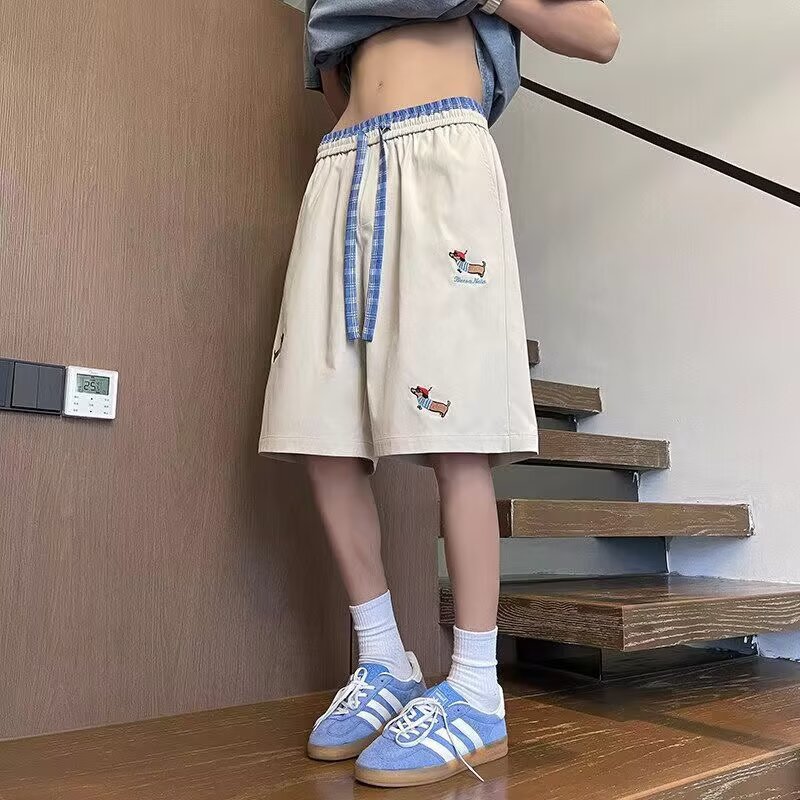 Pantalones casuales bordados de verano tendencia masculina sueltos más grandes pantalones de estilo de salchicha para hombres