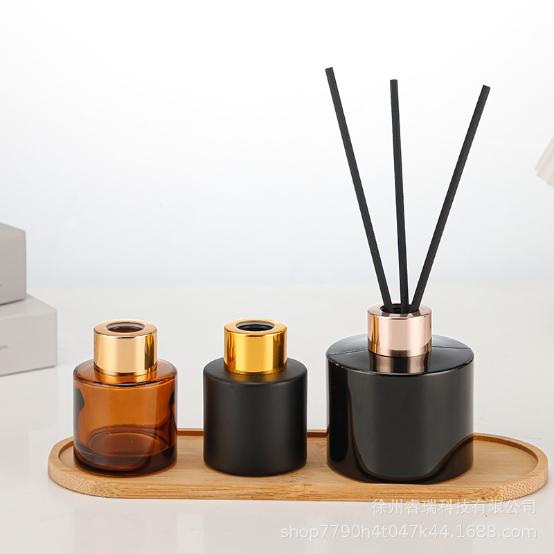 Fabricantes al por mayor botella de aromaterapia redonda de 100ml botella vacía adornos de vidrio expansión botella de incienso desodorante de inodoro