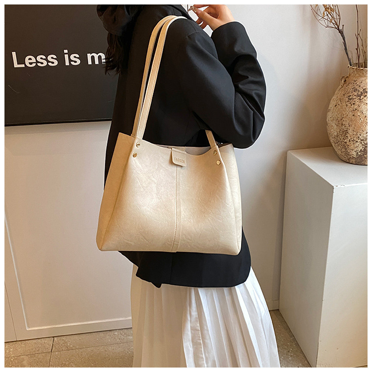 The new 2024 autumn collection features a retro, simple, large-capacity, solid-color, fashionable and individual single-shoulder underarm tote women's bag undefined