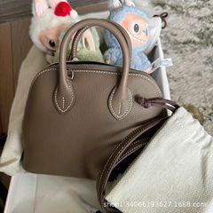 手作りのワックスの糸の新型の輸入のevの頭の層の牛革のボーリングのカバンのミニbolideの手提げの斜め掛けの貝殻のカバン