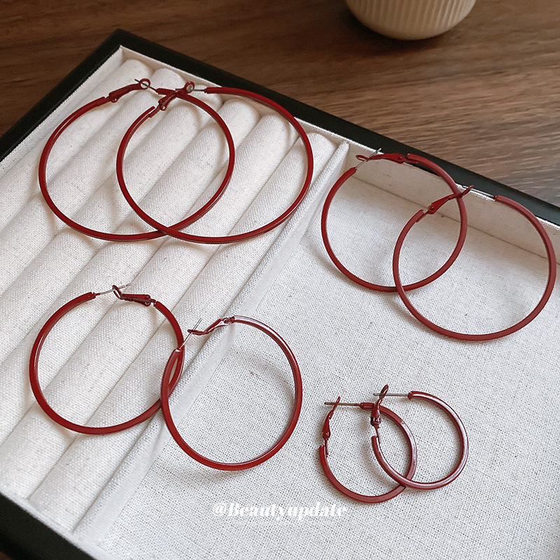 Aguja de plata, anillo de oreja rojo Encola, pendientes de temperamento de nicho retro de moda, pendientes europeos y americanos, lujo ligero, mujeres de alta gama