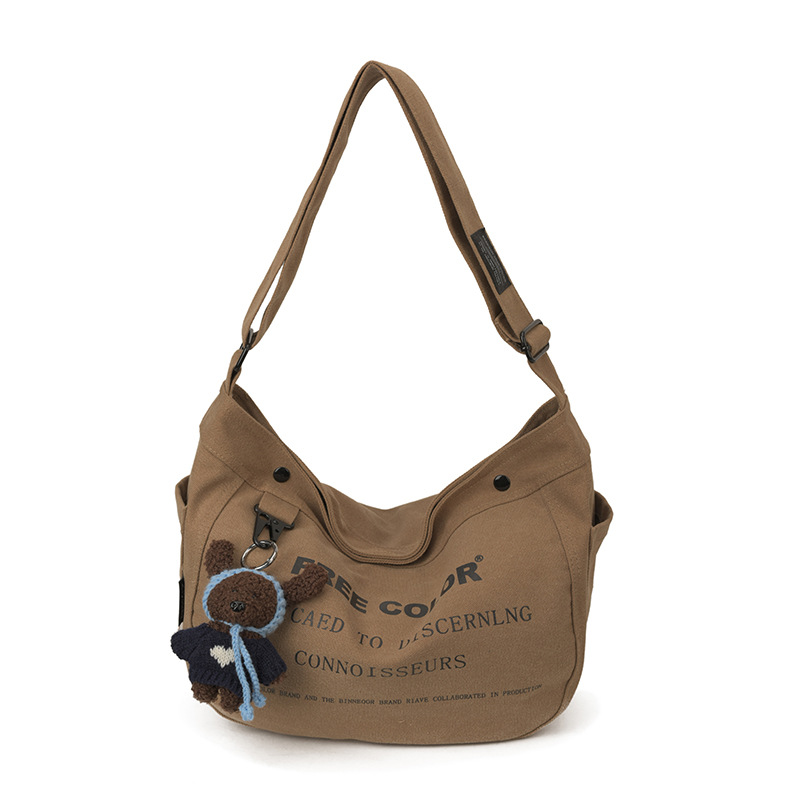 Bolsa de lona para mujeres 2026 nueva bolsa de gran capacidad transfronteriza impresa letras de viaje casual mochila de hombro
