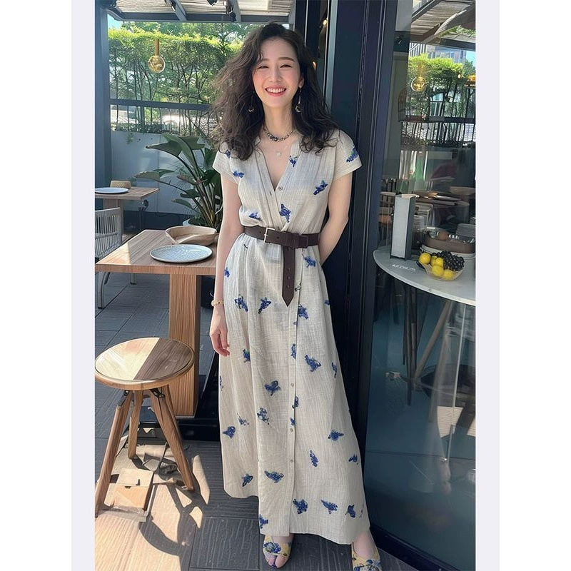 Летнее платье в стиле французского кроя 2025 года, доступная роскошь, элитный стиль, длинная юбка с синим принтом для торжественных мероприятий.