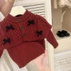 With bow, black