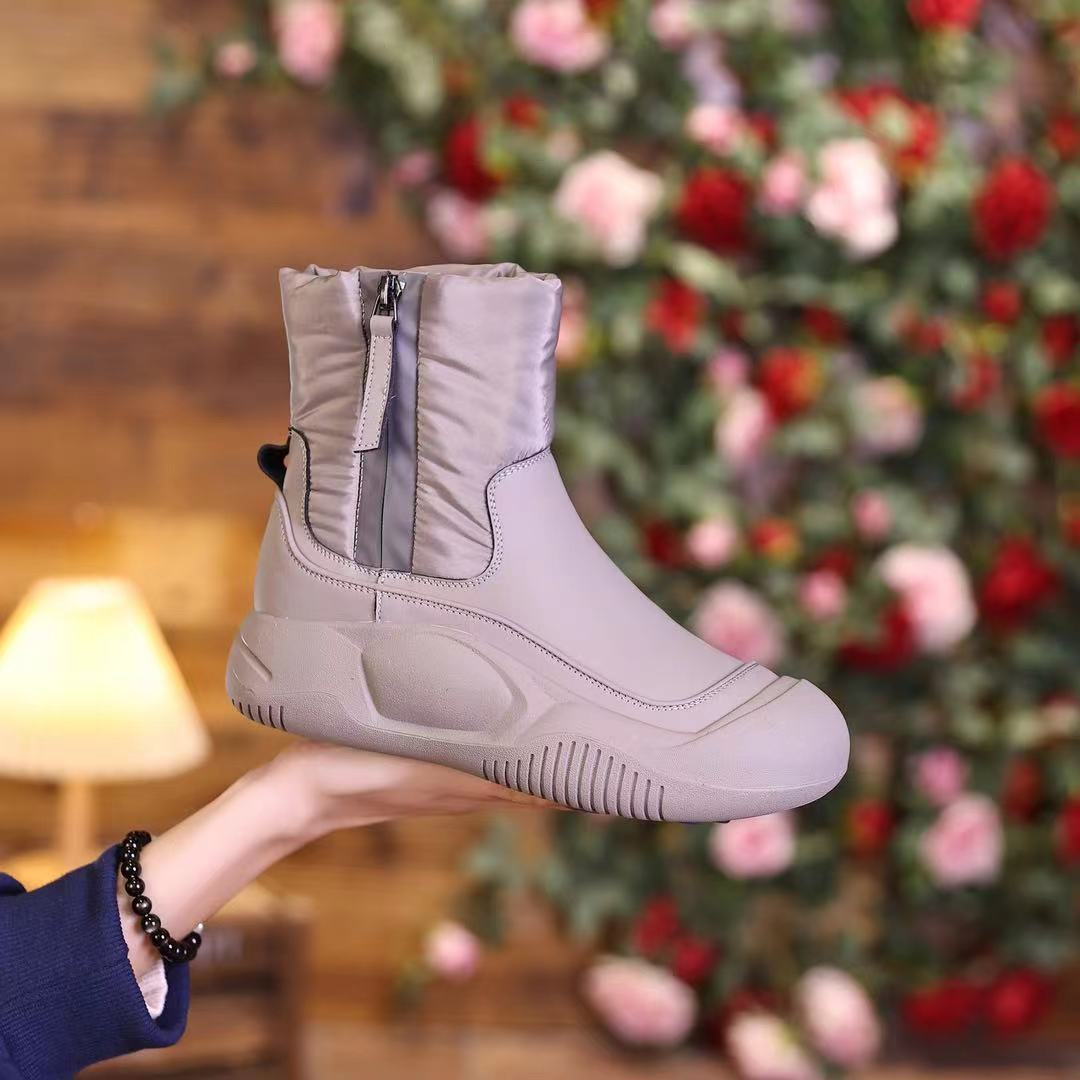 Botas de nieve explosivas mujeres 2024 nuevas botas Martin de invierno para mujeres zapatos de algodón grueso mujeres más botas cortas antideslizantes cálidas de terciopelo mujeres