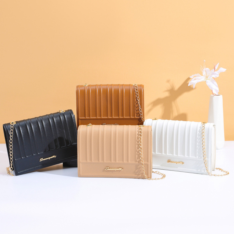 Bolsos de mujer de textura de moda, bolsos de brazo portátiles, bolsos de hombro simples transfronterizos, bolsos de hombro personales, bolsos de cinturón de cadena. image 1