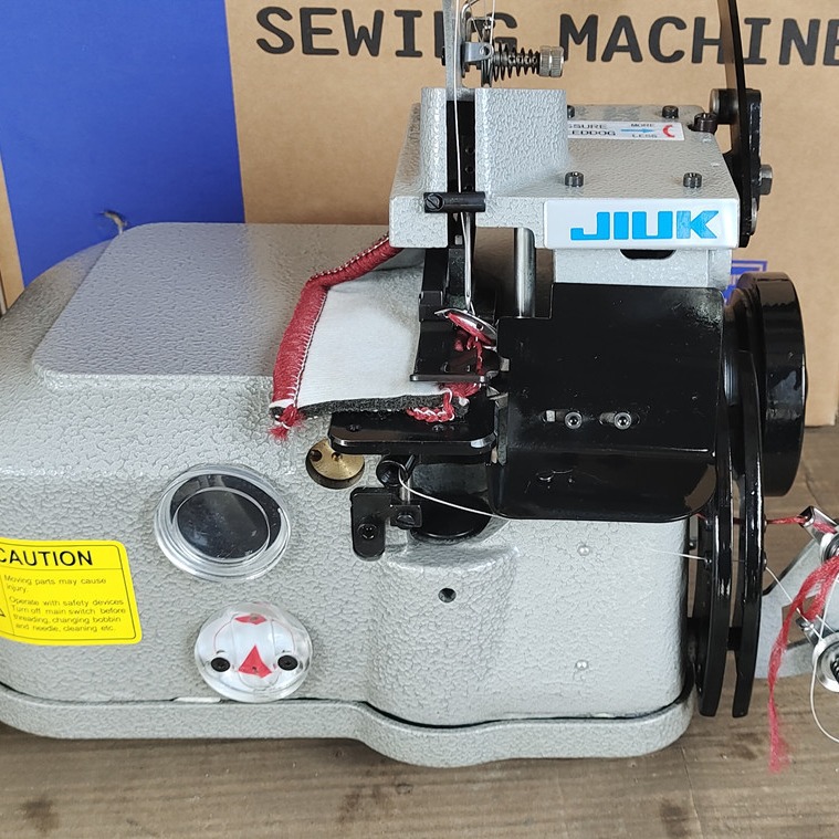 Alfombra borde de la máquina de embalaje tela de material grueso que recibe la máquina almohadilla del pie del coche de tres líneas máquina de red de pesca línea gruesa borde de la máquina de coser