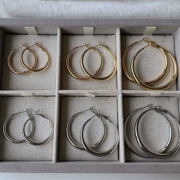 Minimalist Metal Glossy Large Hoop Earrings with a High-End Feel, Unique Design European and American Style Commuter Hoop Earrings Wholesale