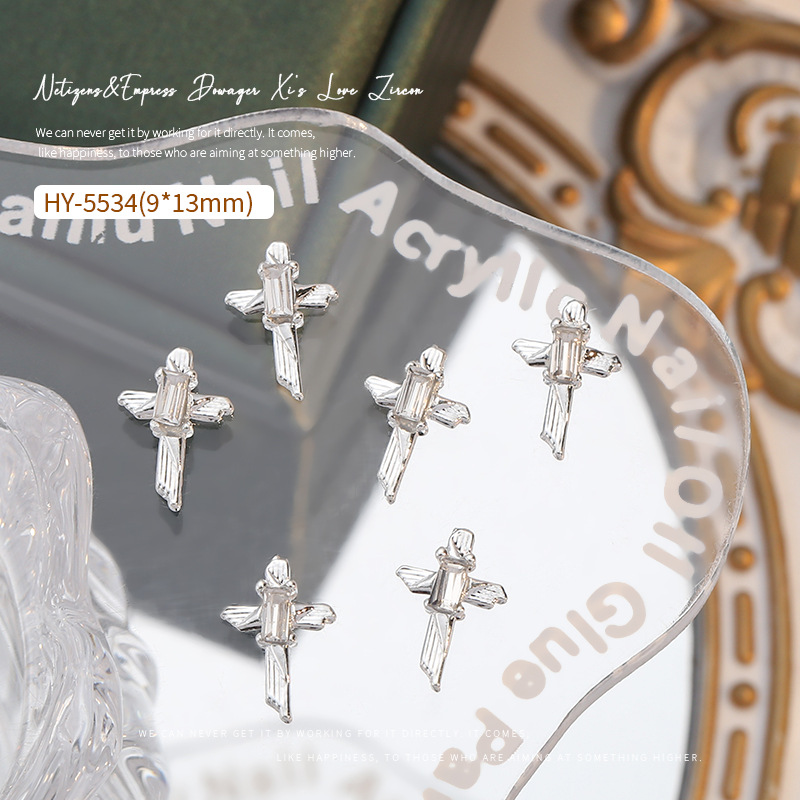 Nueva celebridad en línea flash tridimensional Cruz joyería de uñas de ganchillo taladro de uñas Super Flash aleación decoraciones de uñas