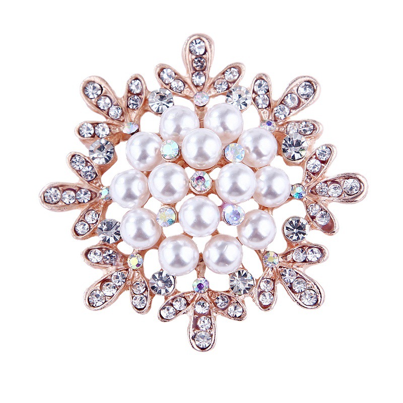 Spilla girasole con perle e strass oro rosa per donna_voghion.com