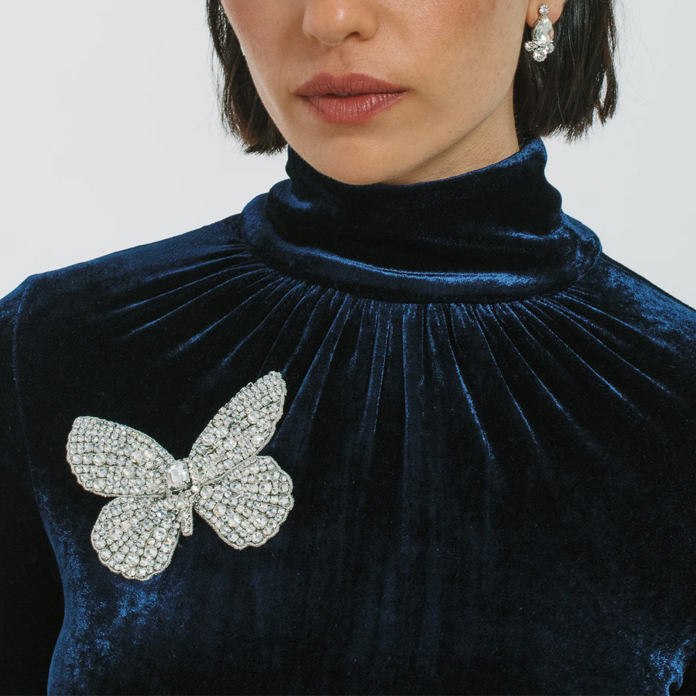 Amazon venta caliente broche de mariposa alta sensación de diamante broche temperamento accesorios broche mujer