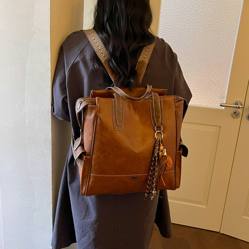 Colegio mochila coreana de gran capacidad 2026 sensación diaria de viaje retro mochila de estilo nuevo estilo mujer
