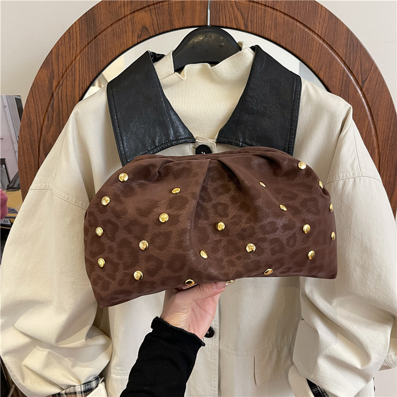 Plegado de tendencia punto de onda de otoño invierno bolso de mano femenino bolso de cena de alta calidad ocio