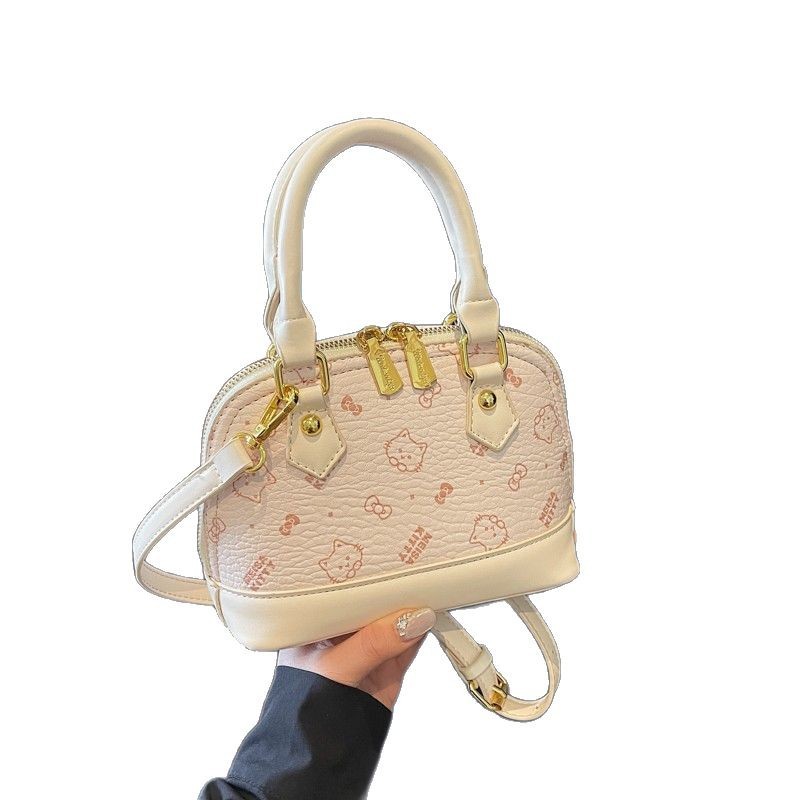 Bolso de mochila para mujeres 2025 textura fresca de alta calidad felina de moda versátil bolso coreano de viaje bolso de hombro