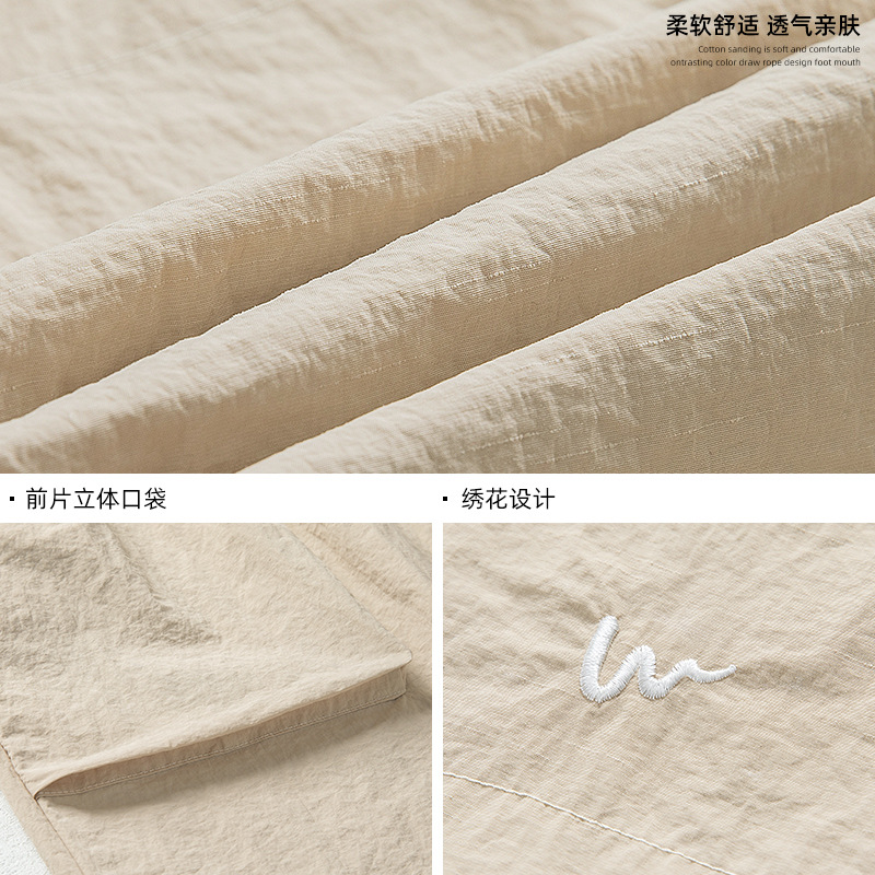 Ropa de hombre de estilo coreano y japonés, pantalones cortos cargo holgados con bolsillos grandes, pantalones cortos casuales bordados de marca de moda estilo veraniego.