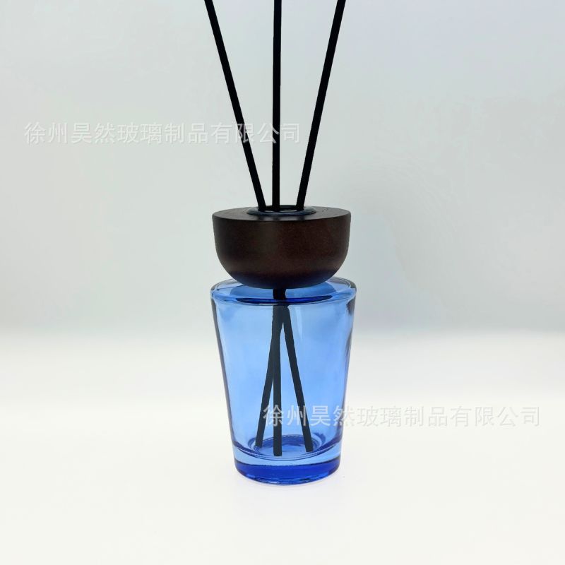 Botella vacía europea simple de alto valor nominal botella de fragancia de madera sólida botella de aceite esencial de caña cónica sin fuego 28 dientes botella de vidrio