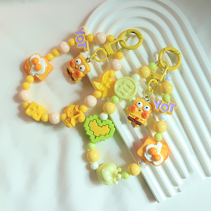 Autumn and winter cheese bread beaded mobile phone chain internet celebrity cute sponge baby bead chain student keychain ornaments wholesale