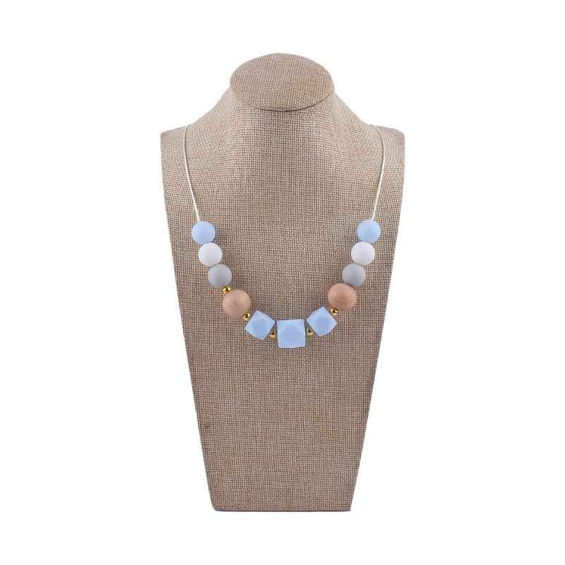 Los nuevos bebés de contraste de color de silicona octogonal mordedor collar de los bebés mordedor palo masticable colgante collar