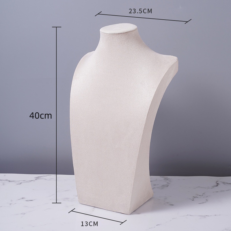 フランネルのネックレスの展示棚の人はモデルのアクセサリー棚のネックレスの首の型のカウンターの陳列道具のネックレスの棚のようです。|undefined
