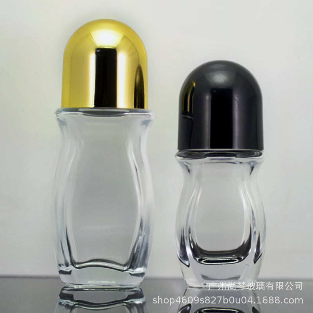 Fabricante en stock 30 botella de bola de rodillo de vidrio 50ml botella de cuentas de masaje botella de aceite esencial cosméticos de viaje portátil sub-botella