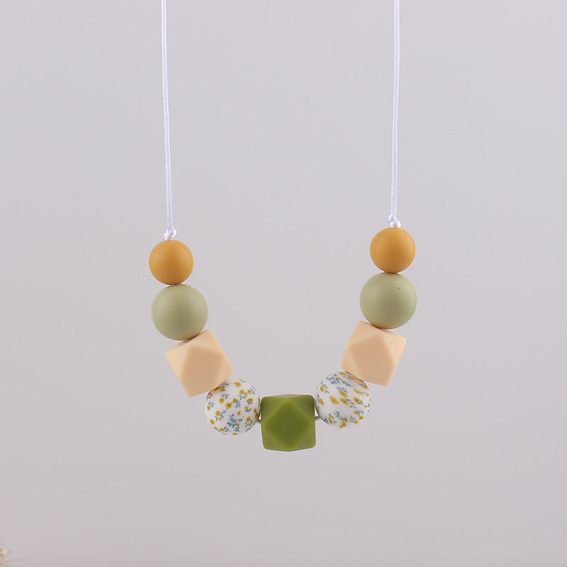 Ins Collar de mordedor para madres y bebés Juguete para bebés Collar de cuentas de silicona por transferencia de agua Collar de madre