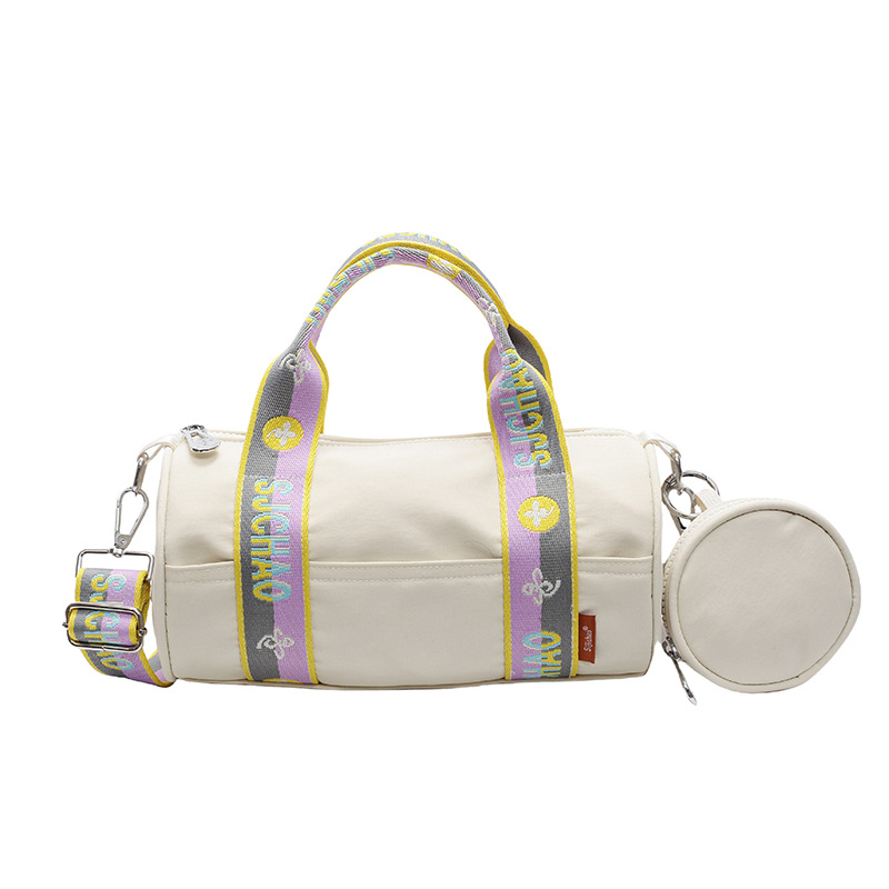 Oxford tela de contraste de color ligero bolso cilíndrico de mano casual para mujeres 2025 nuevo alto valor ocio transporte de viaje mochila