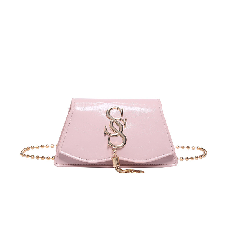 Bolso de tendencia de mujer cadena retro hombro simple letras de moda 2025 primavera nuevo mini mochila bolso pequeño