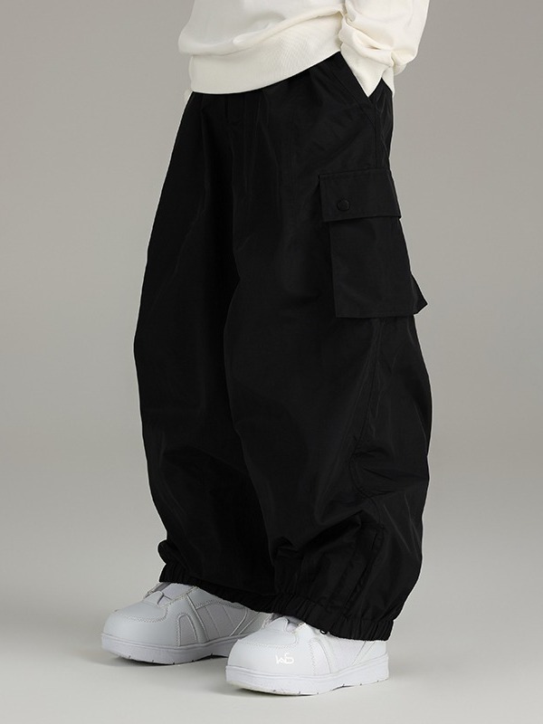 Pantalones de snowboard a prueba de viento impermeables sueltos de primavera y otoño pantalones de hombres y mujeres deportes al aire libre multi-Bolsillo casual pantalones atados al tobillo