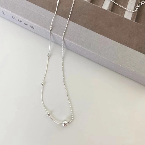 All-over 925 sterling silver simple asymmetric round bead snake bone splicing necklace for women with niche design and minimalist temperament