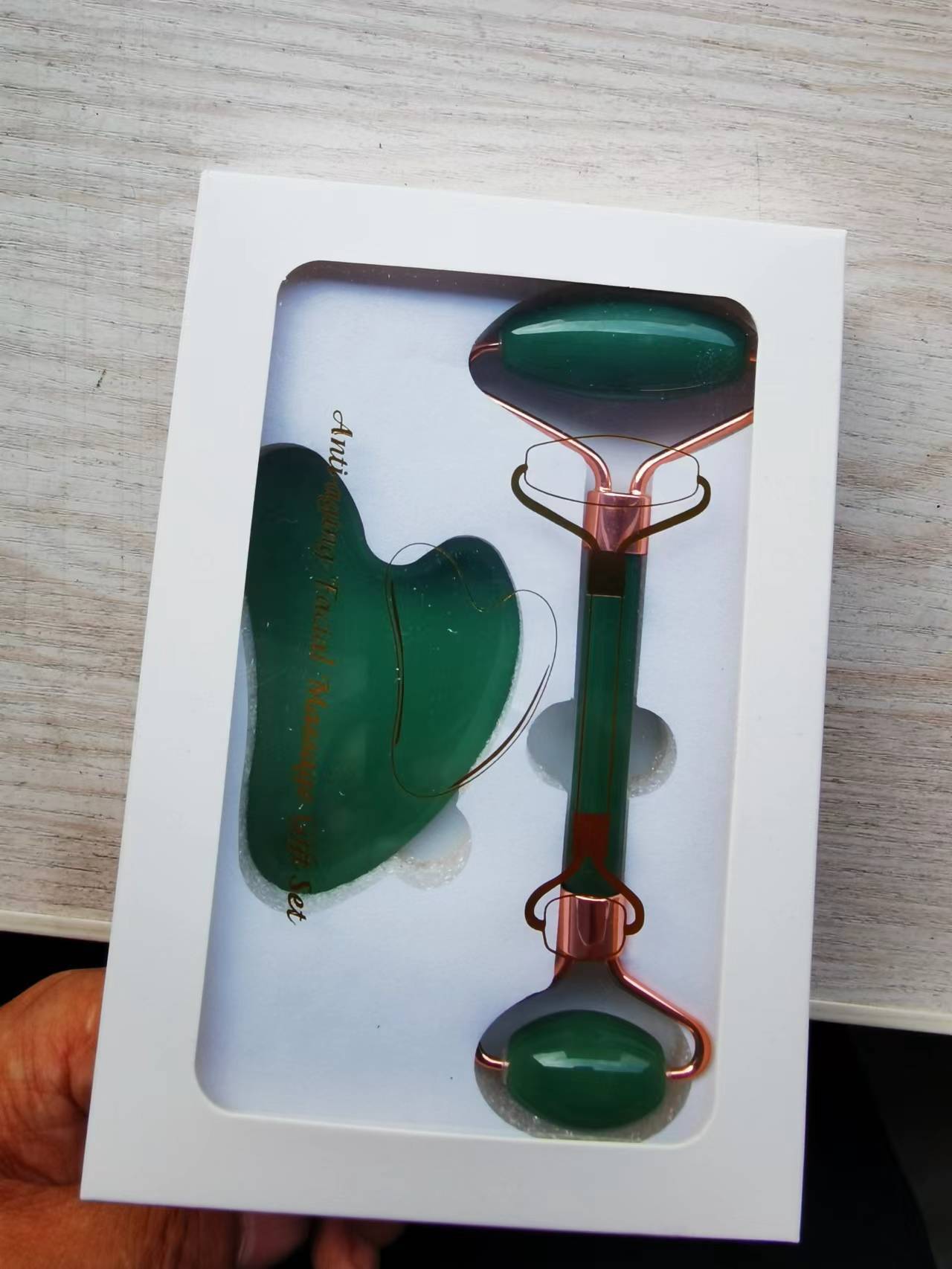 Jade rodillo de masaje facial traje de doble cabeza de metal manual belleza facial relajante dispositivo cara empujando aparato al por mayor