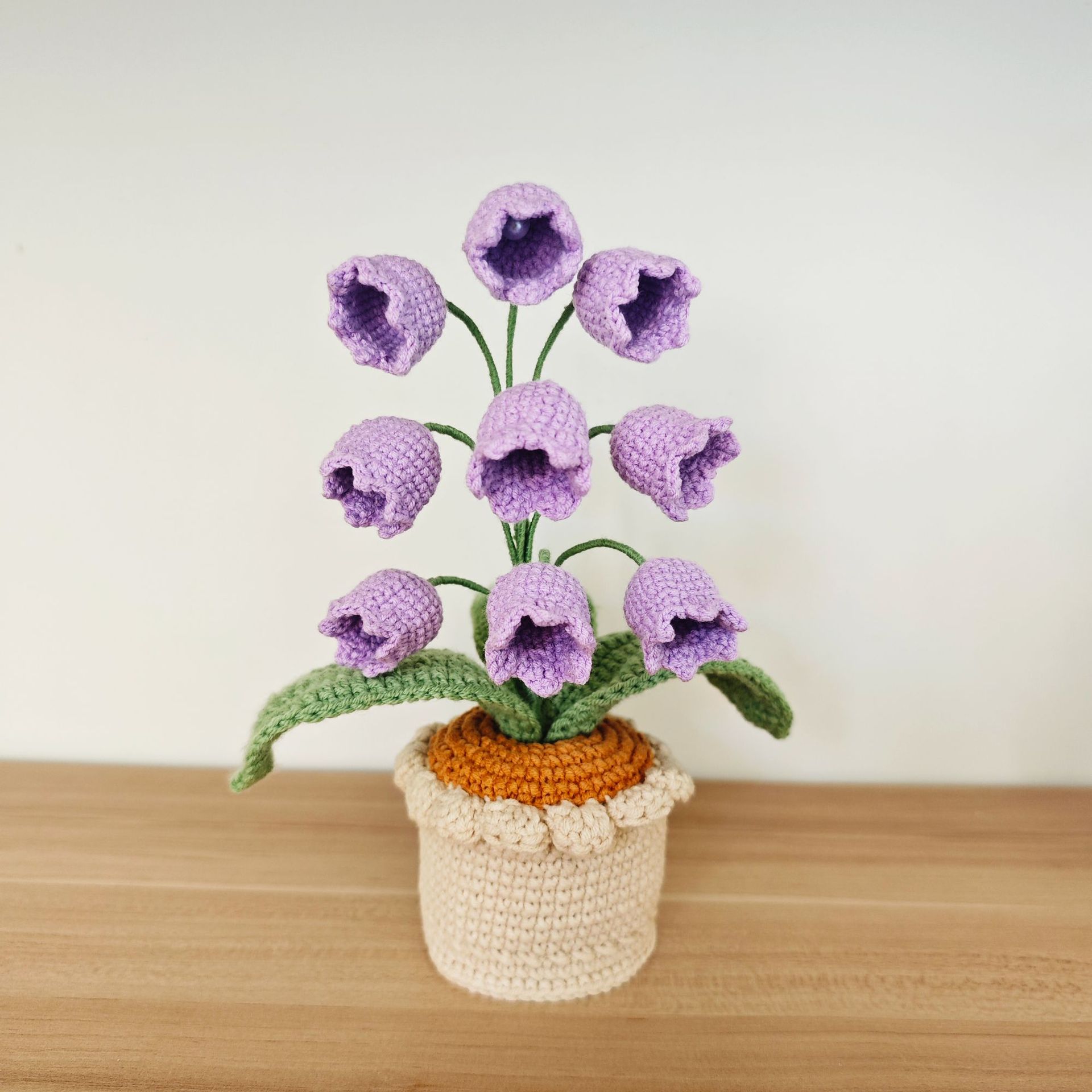 Transfronterizos productos terminados de venta caliente orquídea de campana simulación de gancho artesanal en maceta flor de lana decoración de escritorio de dormitorio