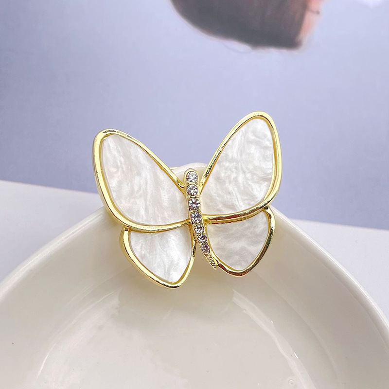 KC gold white imitation shell with diamonds