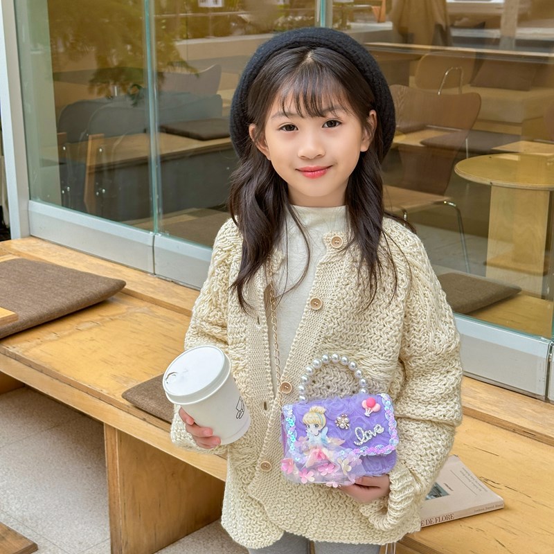 Dulce princesa bolso de hombro de perlas de aire extranjero bolso de mano bebé 2025 nuevo bolso de moda para niños