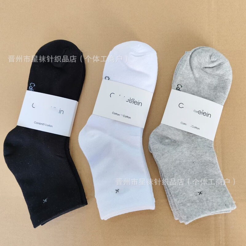 Cross-border foreign trade Tommy men's and women's socks C large K mid-tube solid color black, white, gray business socks, all-season cotton socks wholesale