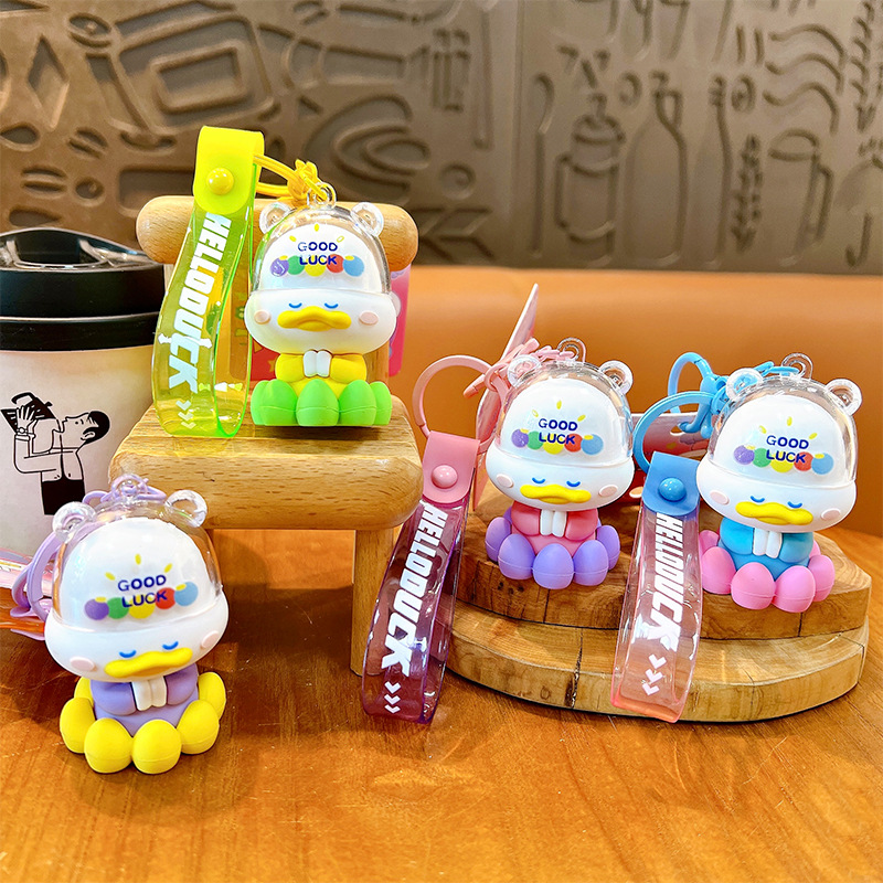 Creativo nuevo toque budista patito llavero lindo bolso colgante llavero de automóvil pequeño regalo al por mayor image 4