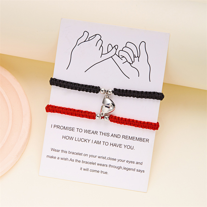 Cross-border new love woven magnetic bracelet fashion hand-woven heart-shaped pendant lovers friendship bracelet wholesale